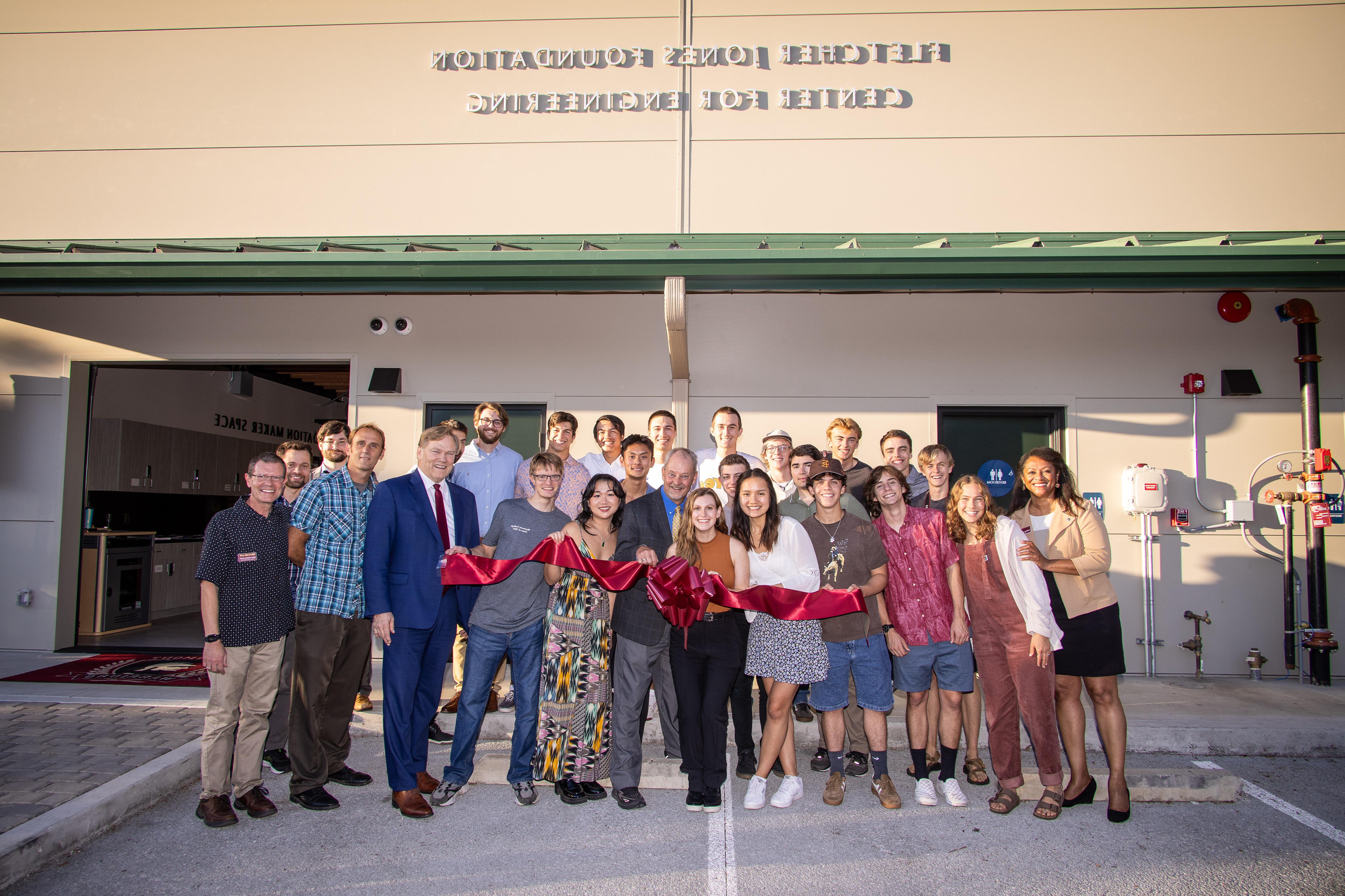 ribbon cutting engineering building with students